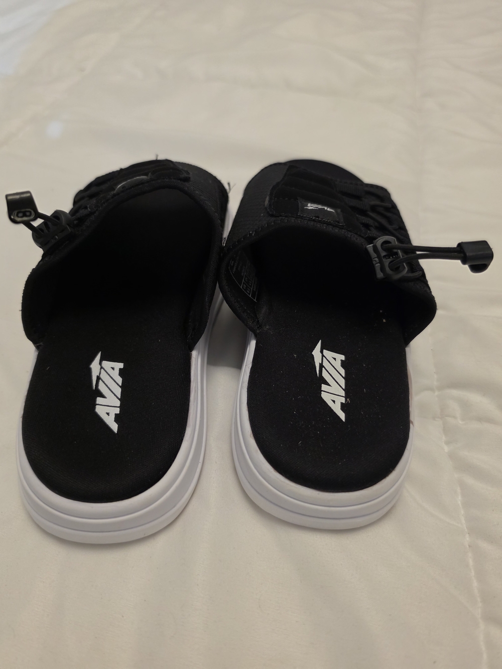 Avia Black Slide Sandals with White Soles and Adjustable Bungee